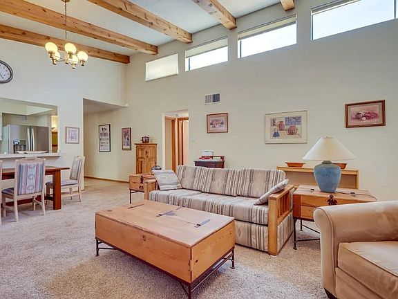 Living room facing foyer.