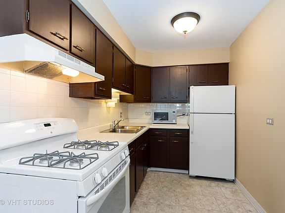 5th image of 8455 W Leland Ave Unit 112