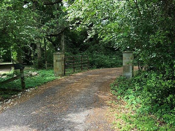 Enter through a private gate to your country road!