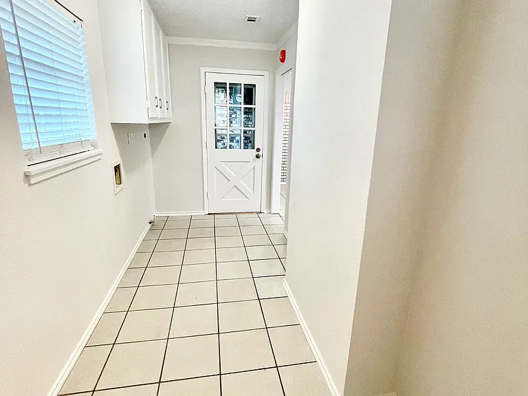 View of opposite end of utility/laundry room