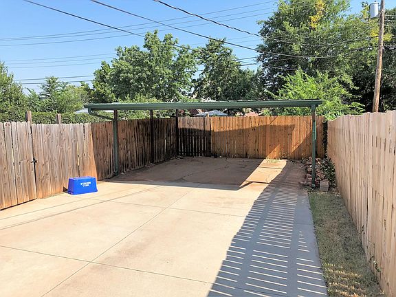 Two-vehicle carport.