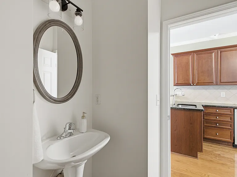 Half bathroom on kitchen/living/dining room floor