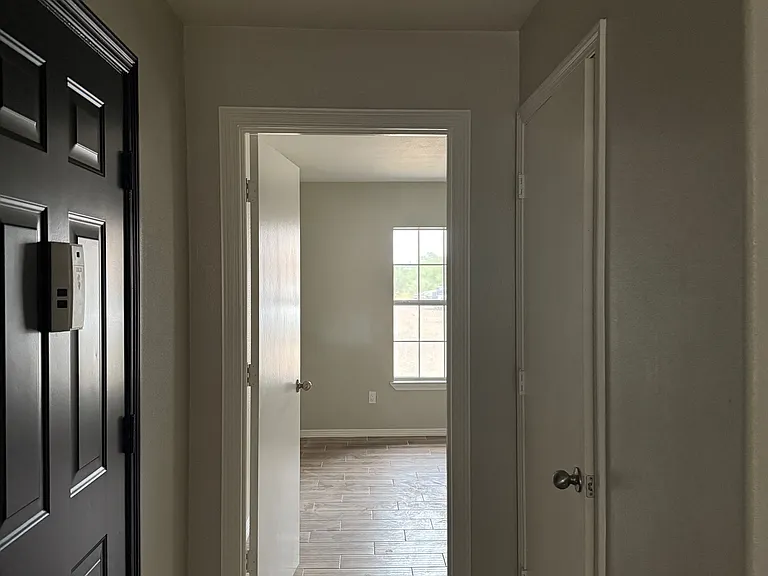 Hallway leading to master bedroom.