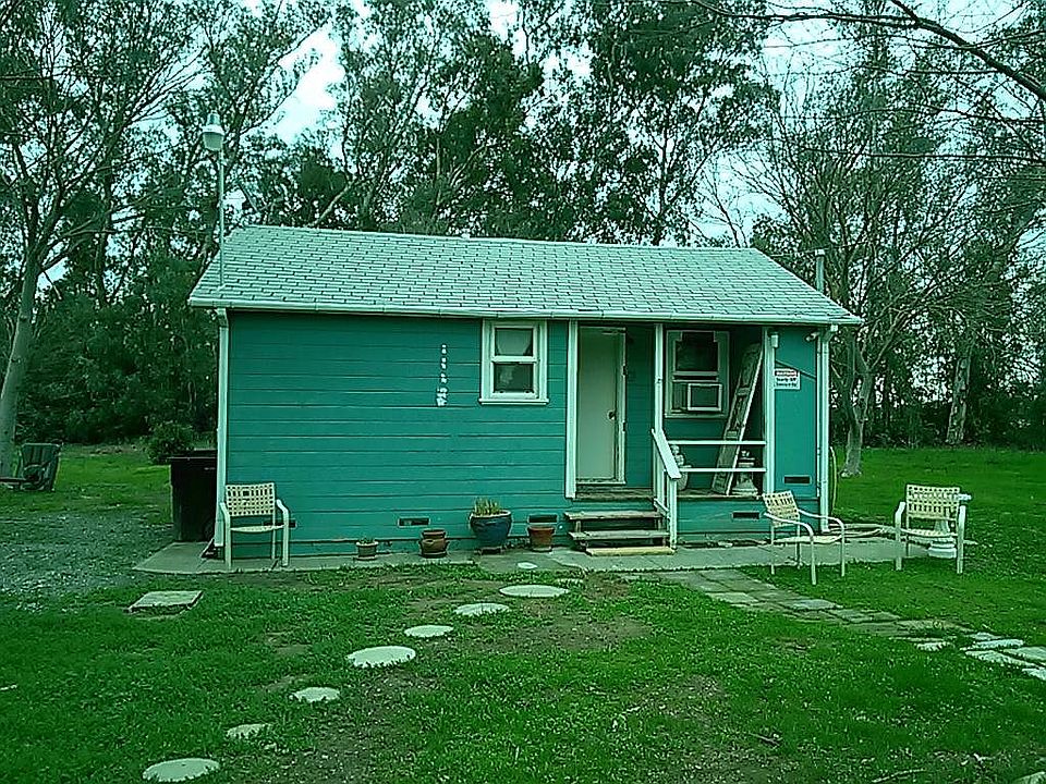 Front of cottage. Big inside