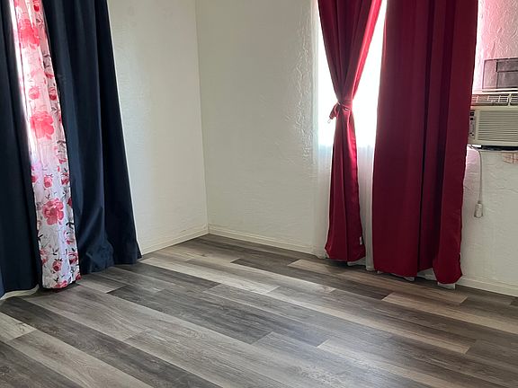 small bedroom with a small closet