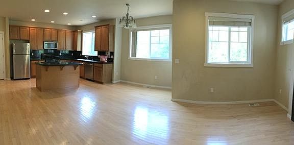 Kitchen opens to the living room .