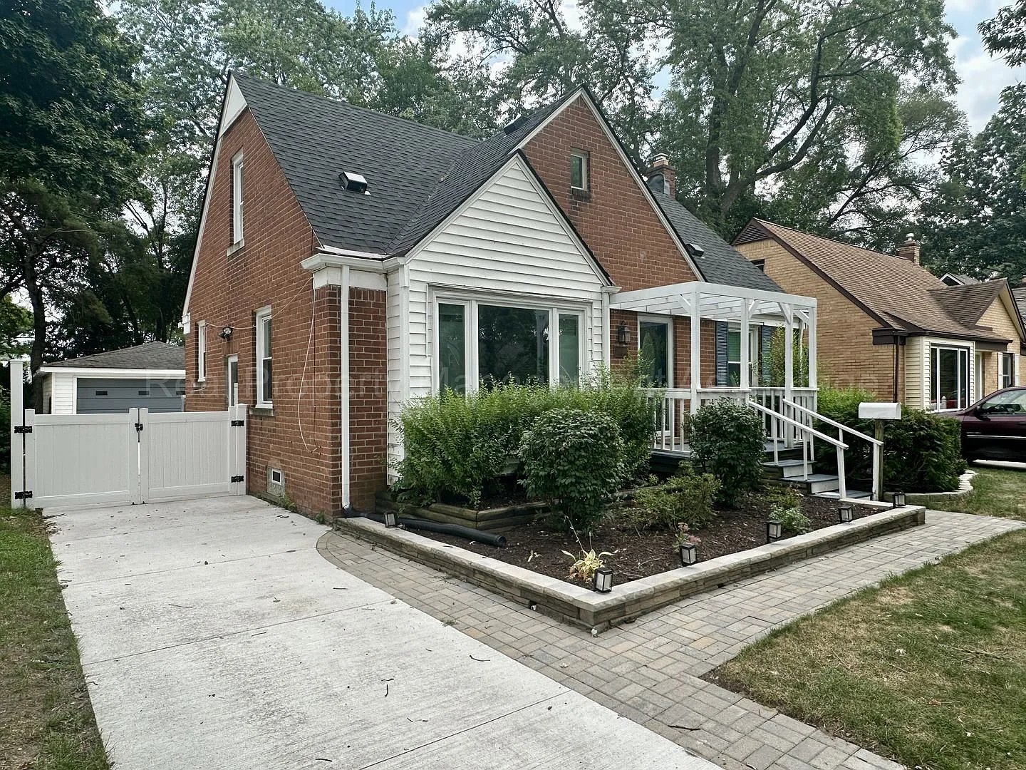 Charming Royal Oak 3-Bed with Sunroom, Deck, and 2.5-Car Garage — Photo 2