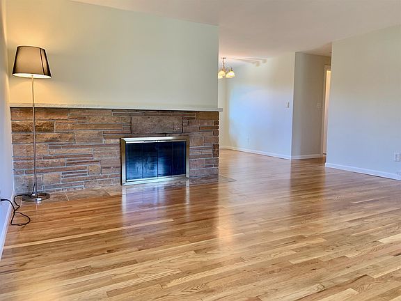 Living Room (30' x 12.5') Flows Seamlessly Into Dining Area