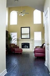 Beautiful family room also has the hand-scraped wood floors