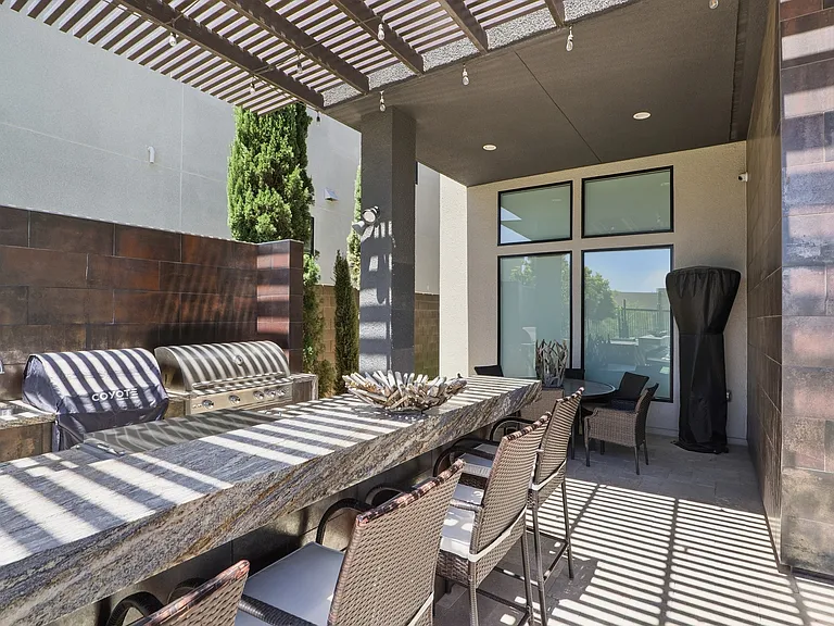 #GuardianRealty 10941 Earth Hues Summerlin Luxury Home Rental outdoor kitchen_06232026
