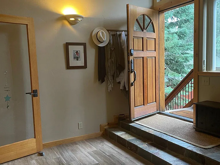 Large mudroom and heat seal. Doubles as a yoga space with heated flooring and full set of yoga props.