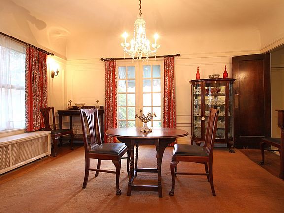 Large dining room with french doors to garden