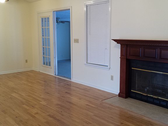 living room w/wood burning f