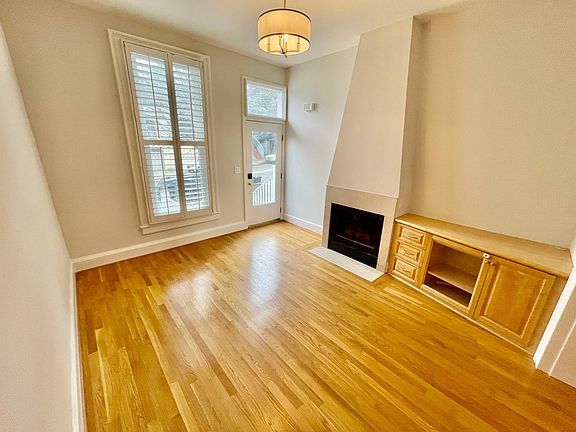 Front living room. Working gas fireplace and built-in for TV.