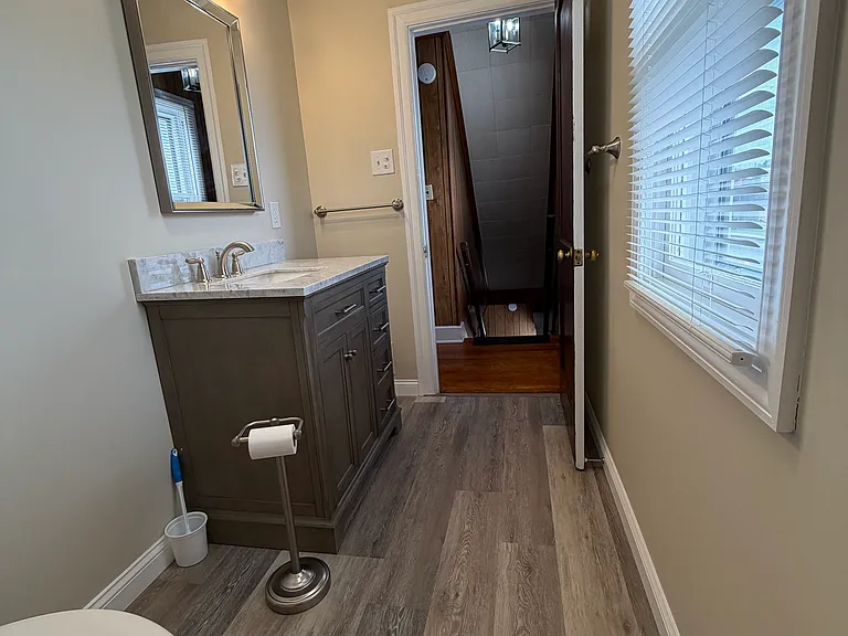 View from inside bathroom, located at the top of the 2nd floor stairway.