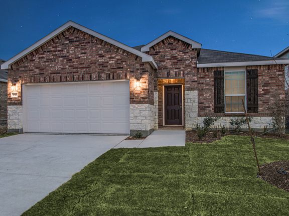 Exterior Q - The Morgan plan, a one-story home with 2-car garage