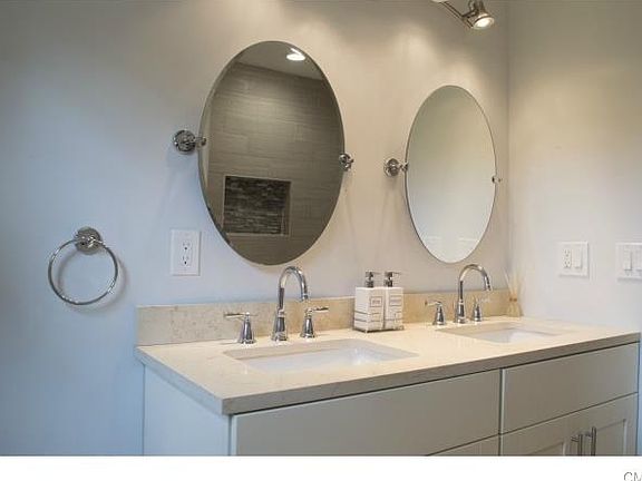 Main bathroom with double vanity.