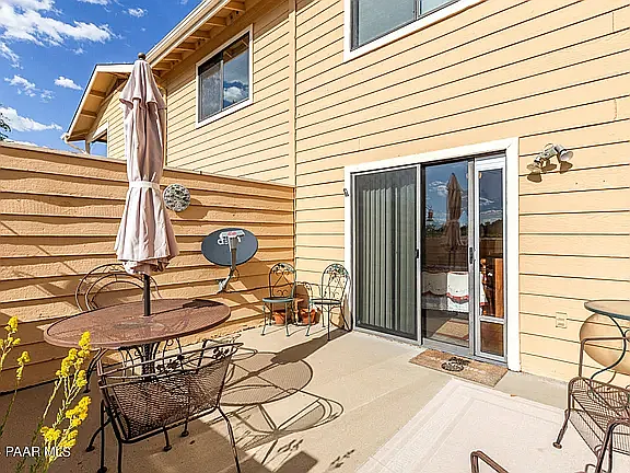 Front gated courtyard off bedroom with doggie door