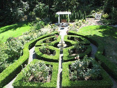 Rose garden, fountain and arbor