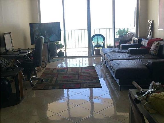 4th image of 5750 Collins Ave Ph B