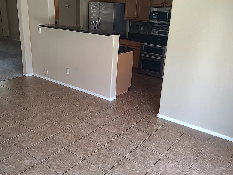 7017 W Saint Catherine Ave — Photo 6