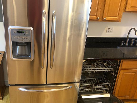 All Stainless Steel refrigerator and dishwasher. Single-lever faucet with soap dispenser.