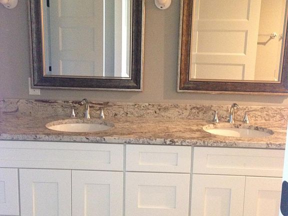 Master vanity. Granite tops; ceramic tile floors. Seperare w