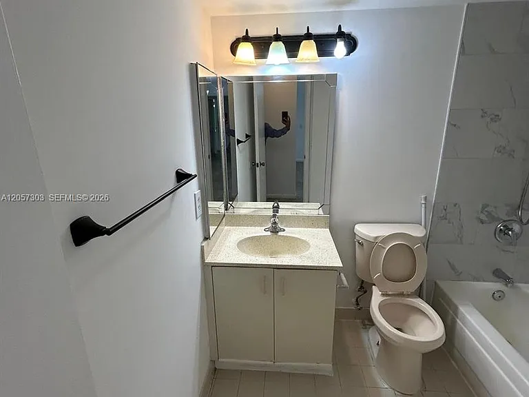 8851 Wiles Rd #208 — Photo 11