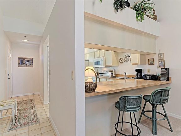 3rd image of 936 Capri Isles Blvd APT 203