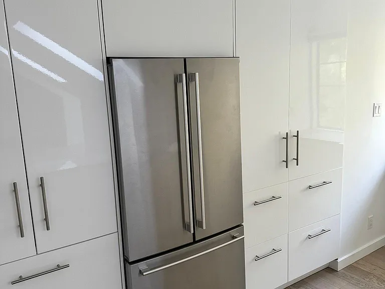 Refrigerator and dishwasher build flush with cabinets
