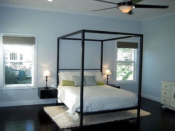 The master is spacious with room for a sitting area.