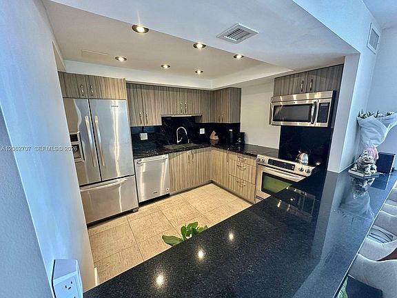 5th image of 801 Three Islands Blvd APT 412