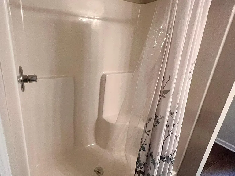 Master bathroom shower/ huge walk in closet and private toilet.