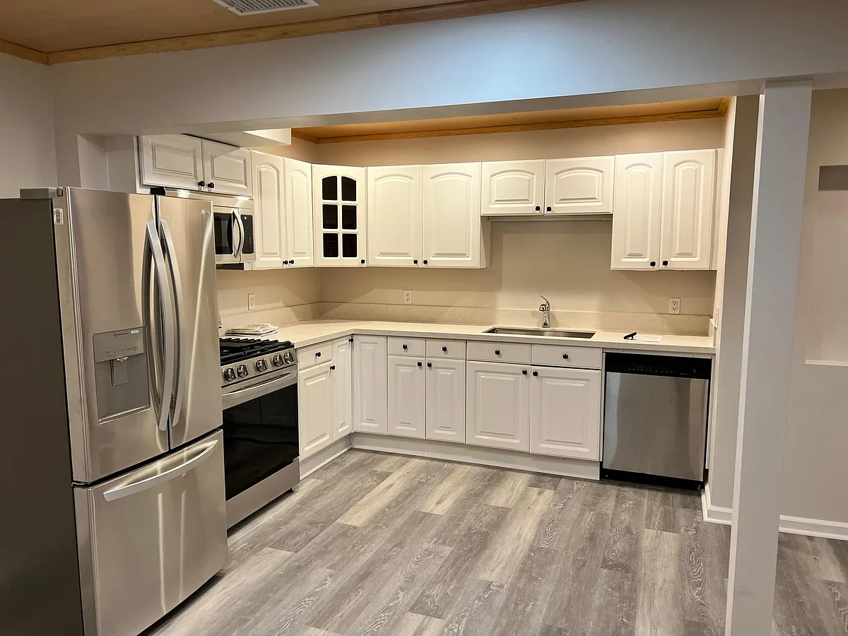 Kitchen equipped with newer appliances - 4491 Olive Ave