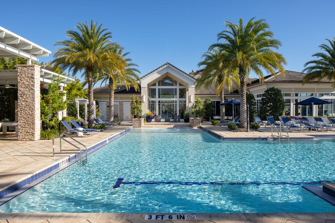 Soak up the sunshine by the sparkling pool.