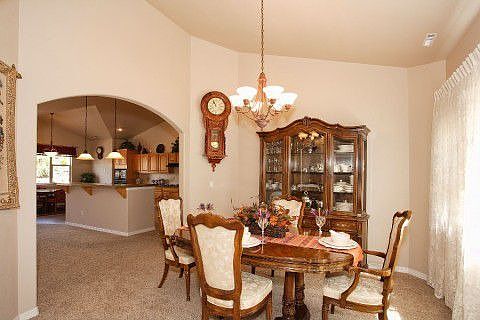 Formal dining room with arched entry