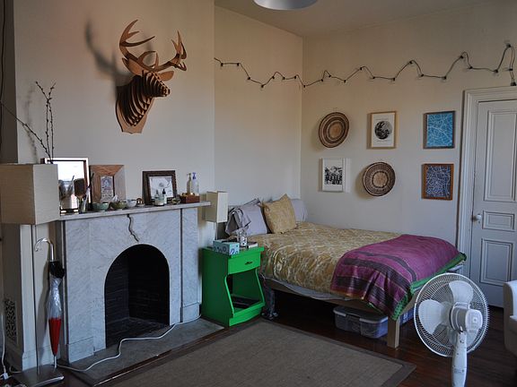 Front bedroom with ornamental fireplace