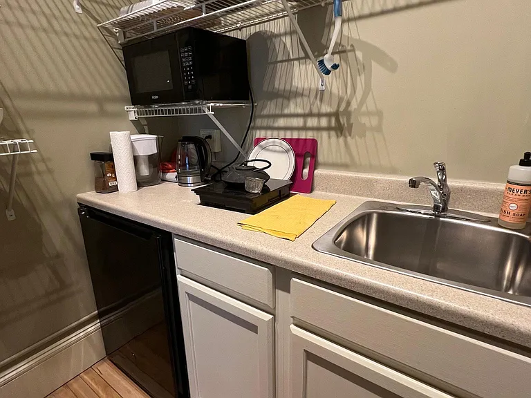 kitchenette with pantry shelves