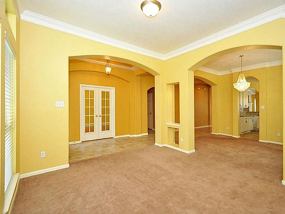 Formal living room and Dining room up front for entertaining. Lots of crown molding and arches for a
