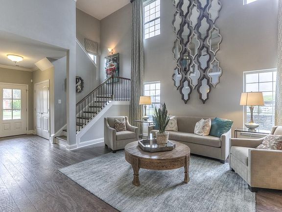 The Wellington Great Room and Foyer This is a model representation, not the actual home