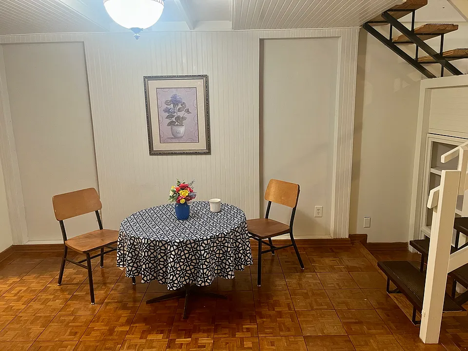 Dining room with loft above.