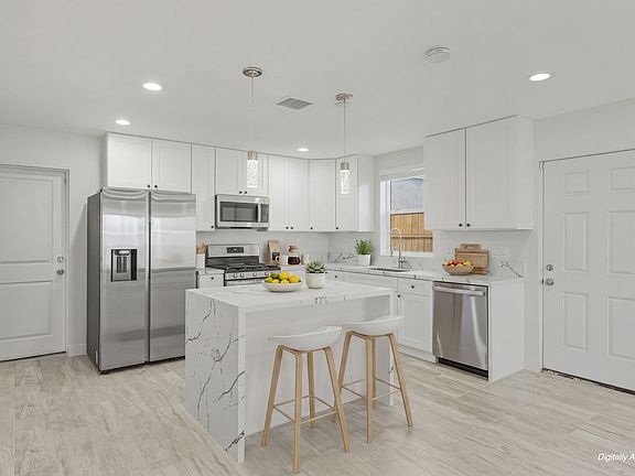 Kitchen with island with digital staging