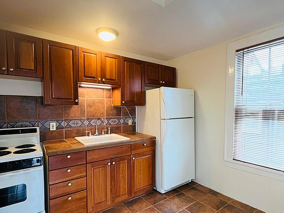 Galley kitchen open to the small living area