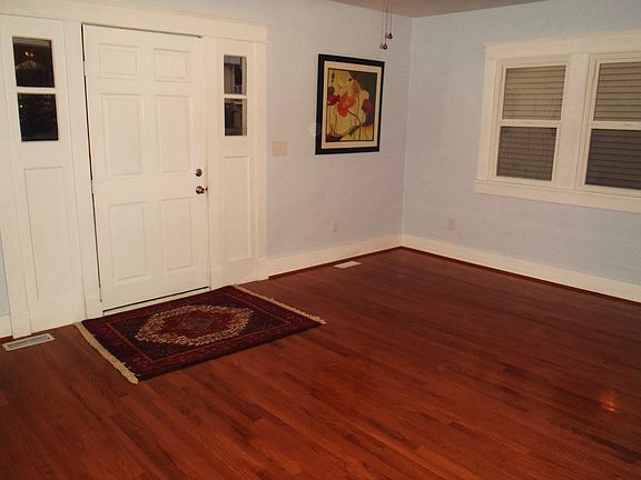 Front door opens into the Living Room.  The double windows add tons of natural