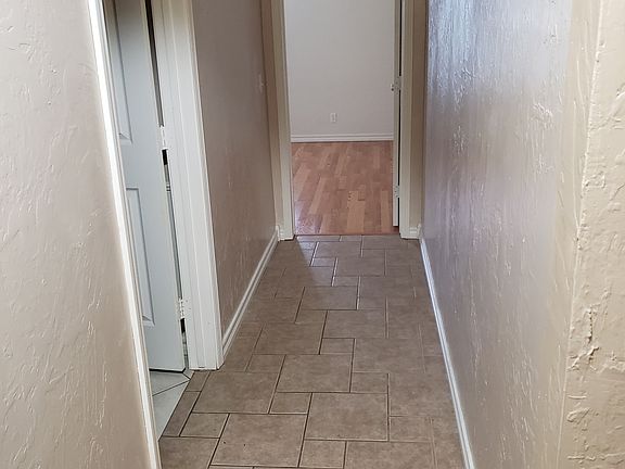 Hallway to 2nd bed and bath