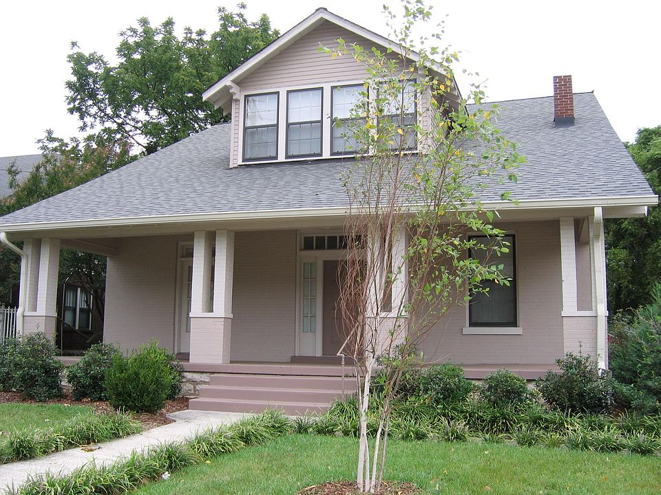 Exterior--apartment entrance is on left side of porch