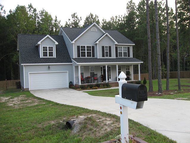 Peaceful, wooded, and over 1 acre.