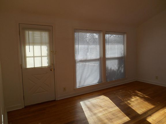 living room with door to outside decki