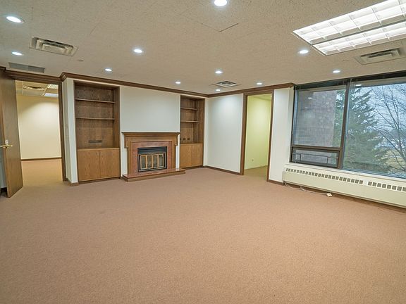 Executive Suite #4 - fireplace and built in bookcases