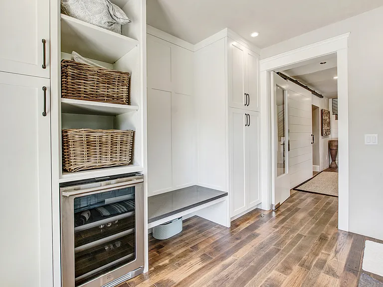 laundry Room with Beverage Fridge and Bench